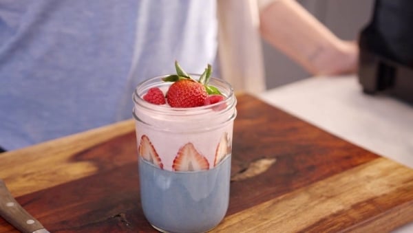 Strawberry yogurt parfait with berries on top